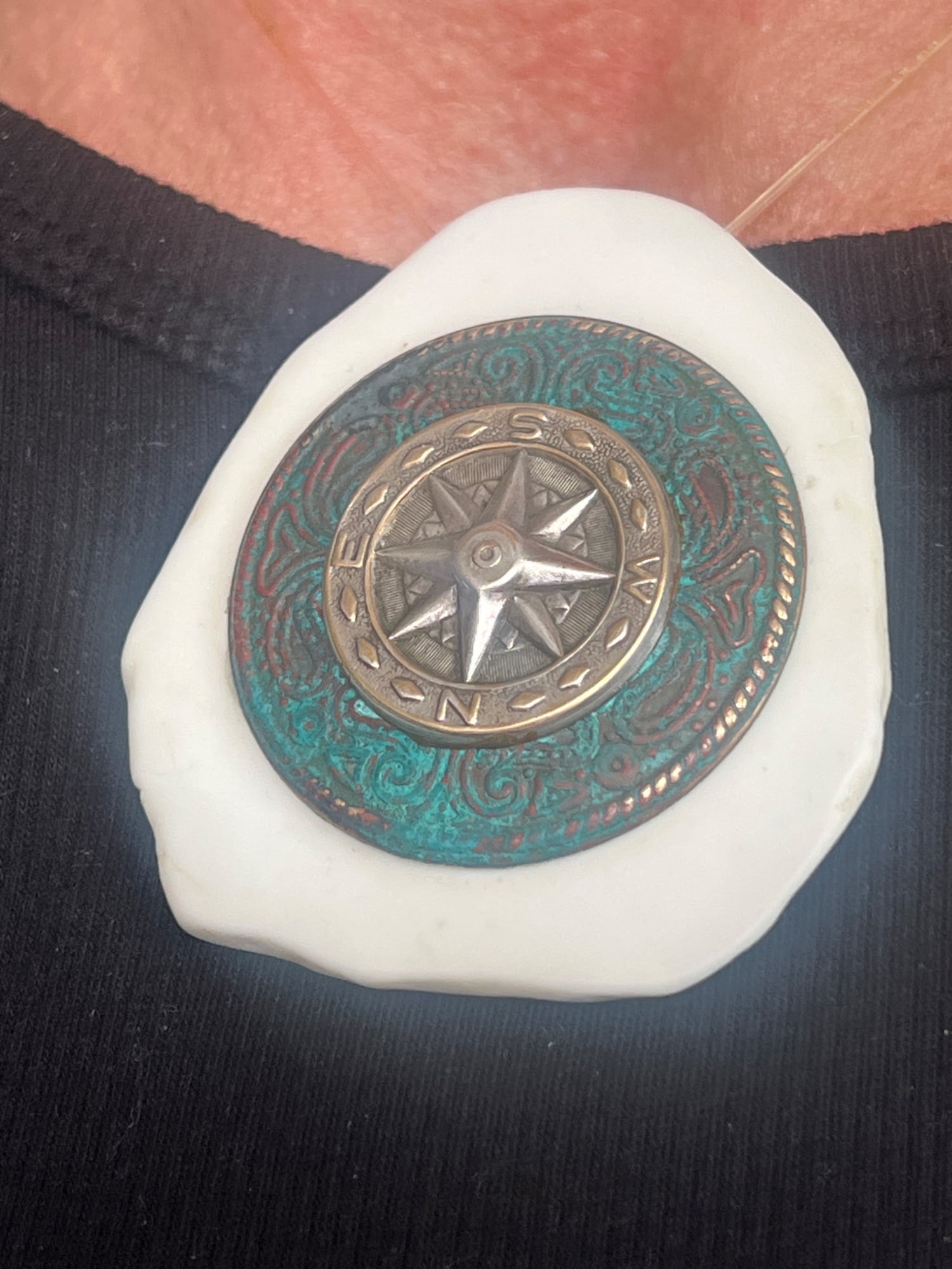 White howIite stone base with metal